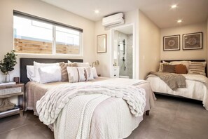 4 bedrooms, desk, iron/ironing board, travel cot
