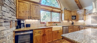 Private alpine hideaway with fireplaces, furnished deck, & designer kitchen - dog-friendly