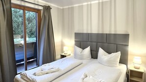 2 多间卧室、旅行婴儿床、免费 WiFi、床单