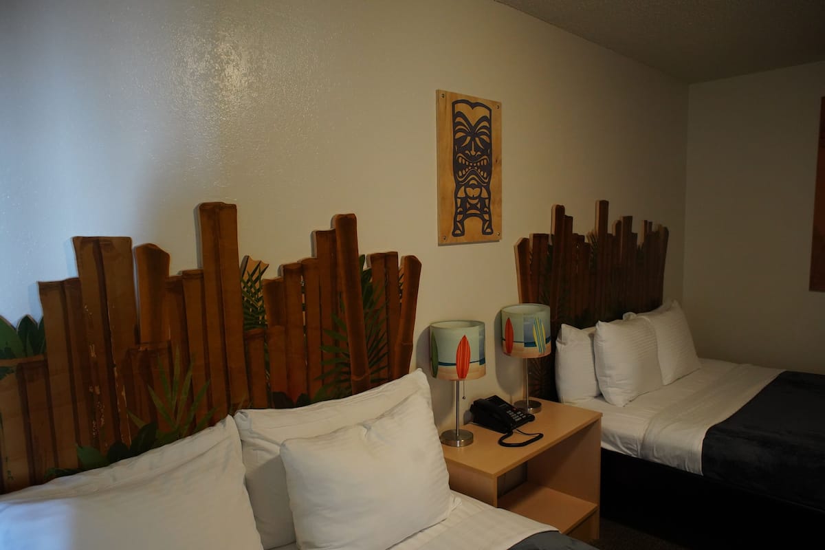 Room 7, 2 Queen Beds | Individually decorated, laptop workspace, blackout drapes
