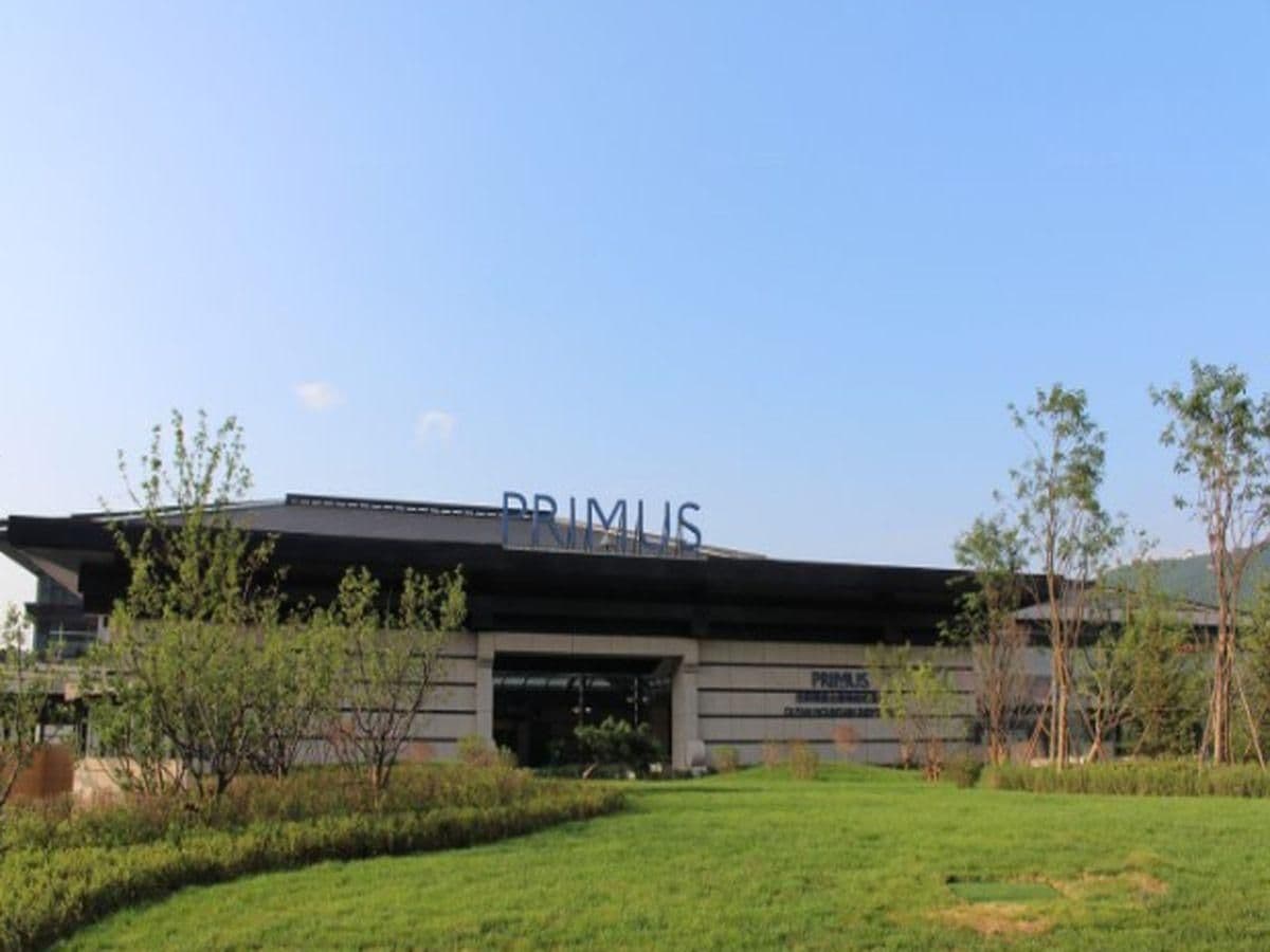 A modern building with the name 'PRIMUS' prominently displayed on the facade.