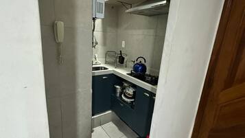 Apartamento | Cozinha privada | Geladeira, micro-ondas, máquina de café expresso, liquidificador