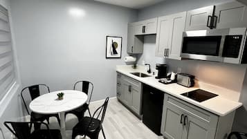 Fridge, microwave, stovetop, coffee/tea maker