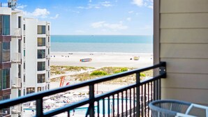 A balcony with a view of a beach, a pool, and a building with multiple floors. - Penthouse in Wildwood Crest- Best Views! (Wildwood)