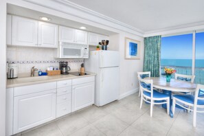 Fridge, microwave, stovetop, coffee/tea maker