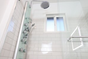 Shower, hair dryer, towels, soap