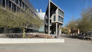 A modern building with large windows, a concrete facade, and a flat roof. - 3 Bedrm, 2 Bath, 6 Guest House by Cubs Spring Training Stadium, ASU, Scottsdale  (Mesa)