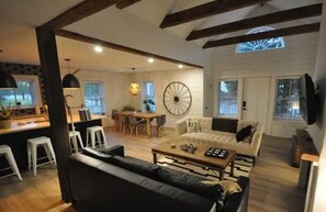 Smart TV, fireplace, books