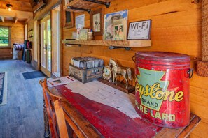 A wooden interior with a vintage-style counter, a can of Crest toothpaste, and a Wi-Fi sign.