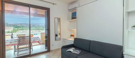 21-inch flat-screen TV with cable channels, TV