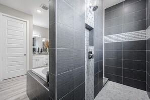 Bathtub, hair dryer, towels