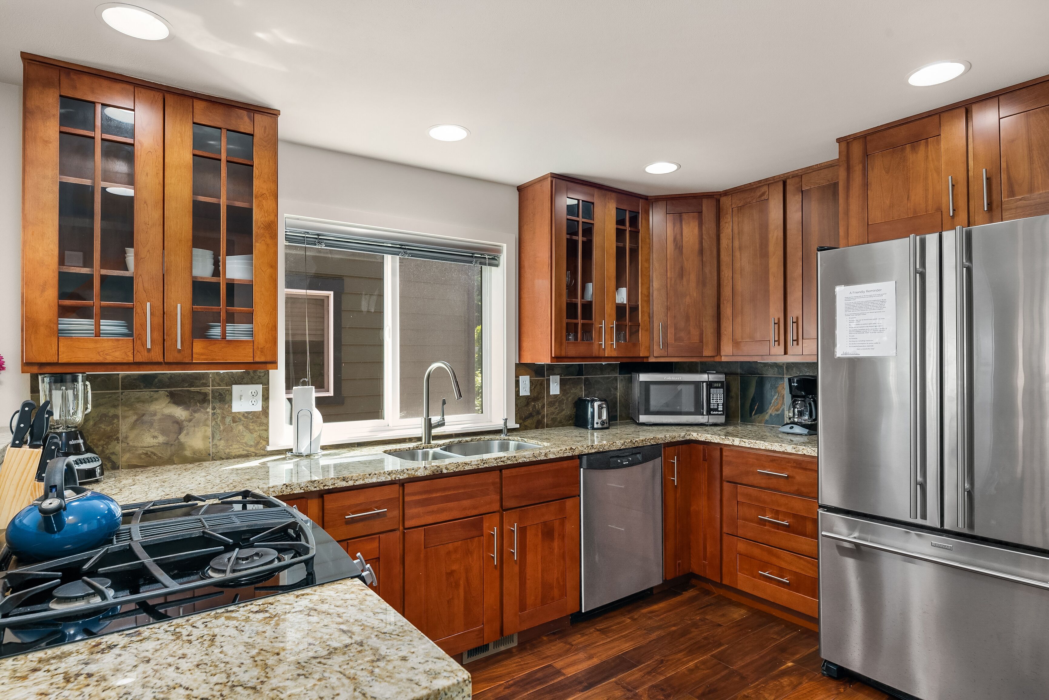 Townhome | Private kitchen | Full-sized fridge, microwave, oven, stovetop