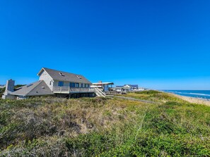 Exterior - Sunrise - This unique 5 BR Oceanfront home offers views up and down the Outer Banks coast! (Southern Shores)