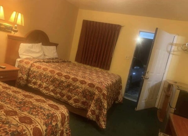 Double or Twin Room | Living area - Economy INN poteau (Poteau)