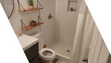 Luxury Duplex | Bathroom | Shower, hair dryer, towels, soap