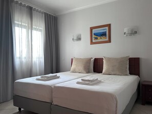 1 habitación, tabla de planchar con plancha, wifi y ropa de cama 