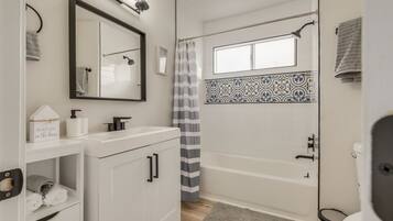 Hair dryer, towels, soap, shampoo