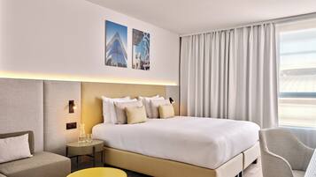 Premium bedding, in-room safe, laptop workspace, blackout curtains