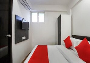 Habitación doble Deluxe | Camas extra, wifi gratis y ropa de cama