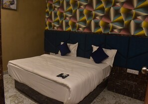 Habitación doble Deluxe | Camas extra, wifi gratis y ropa de cama