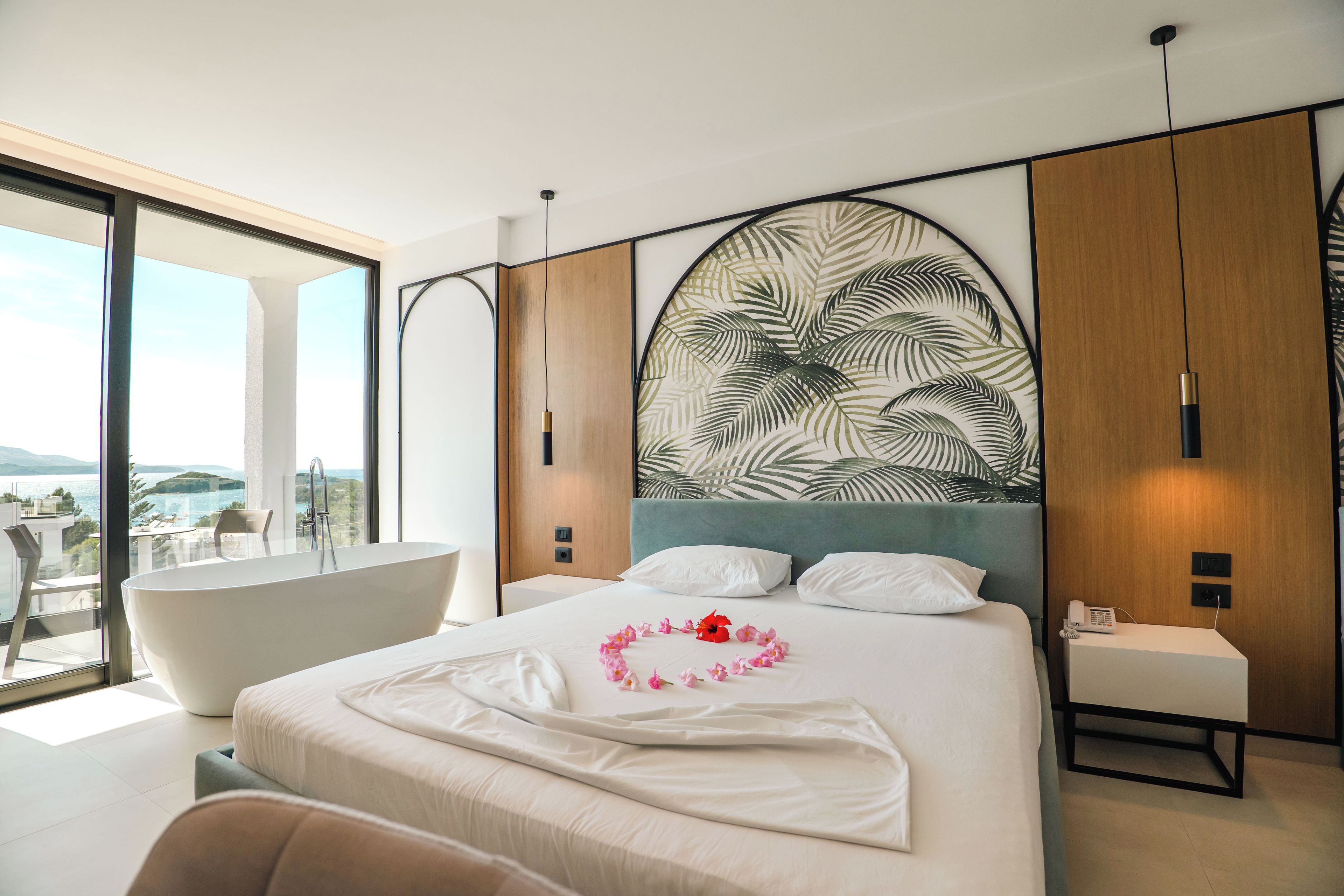 Superior Triple Room, Hot Tub, Sea View | Minibar, in-room safe, desk, blackout curtains