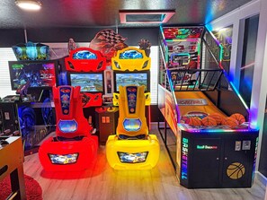 Game room - 8BR • Arcade & Game Room • 2 Theaters • Pool & Spa (Davenport)