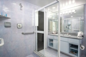 Bathtub, hair dryer, towels, soap