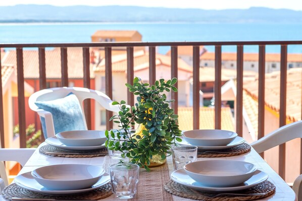 Outdoor dining - Holiday Apartment "Sea View" with Private Balcony & A/C (Isola Rossa)