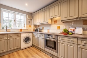 Fridge, microwave, dishwasher, coffee/tea maker