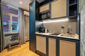 Fridge, microwave, stovetop, coffee/tea maker