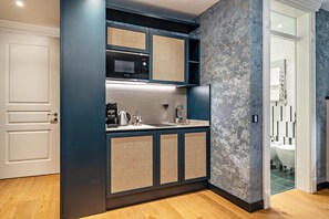 Fridge, microwave, stovetop, coffee/tea maker