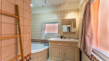 Bathtub, hair dryer, towels