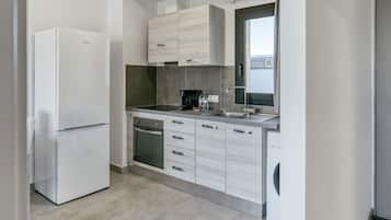 Frigorifero, forno, piano cottura, macchina per tè/caffè