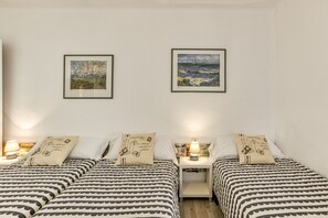 2 habitaciones, tabla de planchar con plancha, internet y ropa de cama 