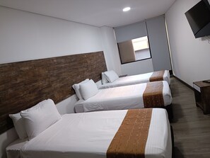 Business Triple Room | Premium bedding, in-room safe, free WiFi, bed sheets - HOTEL AMERICAN VISA CORPORATE (Bogotá)