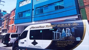 A modern hotel building with multiple floors and a prominent blue facade. - HOTEL AMERICAN VISA CORPORATE (Bogotá)