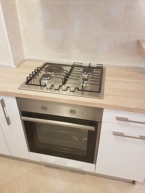 Apartment (Superior Two Bedroom Apartment with T) | Private kitchen | Fridge, dining tables