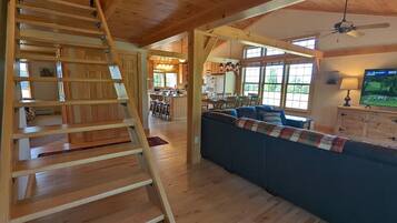 Smart-tv, bordtennisbord, bøger