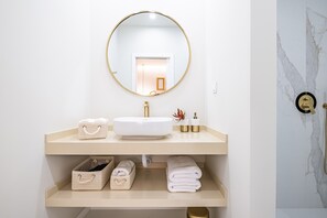 Shower, hair dryer, towels