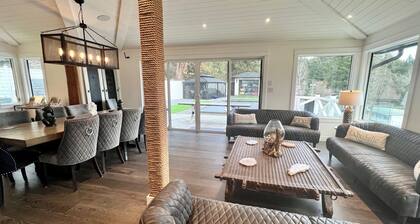 Lakefront(partial) dock pool hot tub barrel rolled sauna gym bunk house fire pit