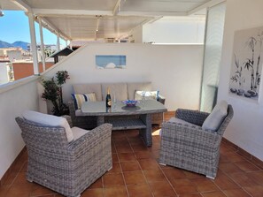 Relax on the balcony with a bottle of champagne and enjoy the serene atmosphere.