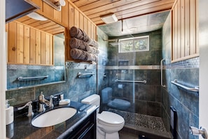 Shower, jetted tub, free toiletries, towels