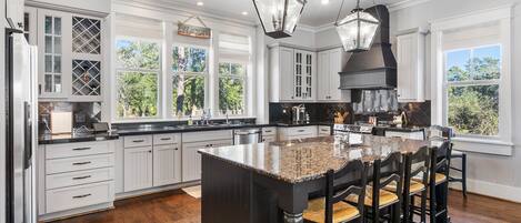 Huis, meerdere bedden, patio, uitzicht op tuin | Privékeuken | Een koelkast, een magnetron, een oven, een kookplaat