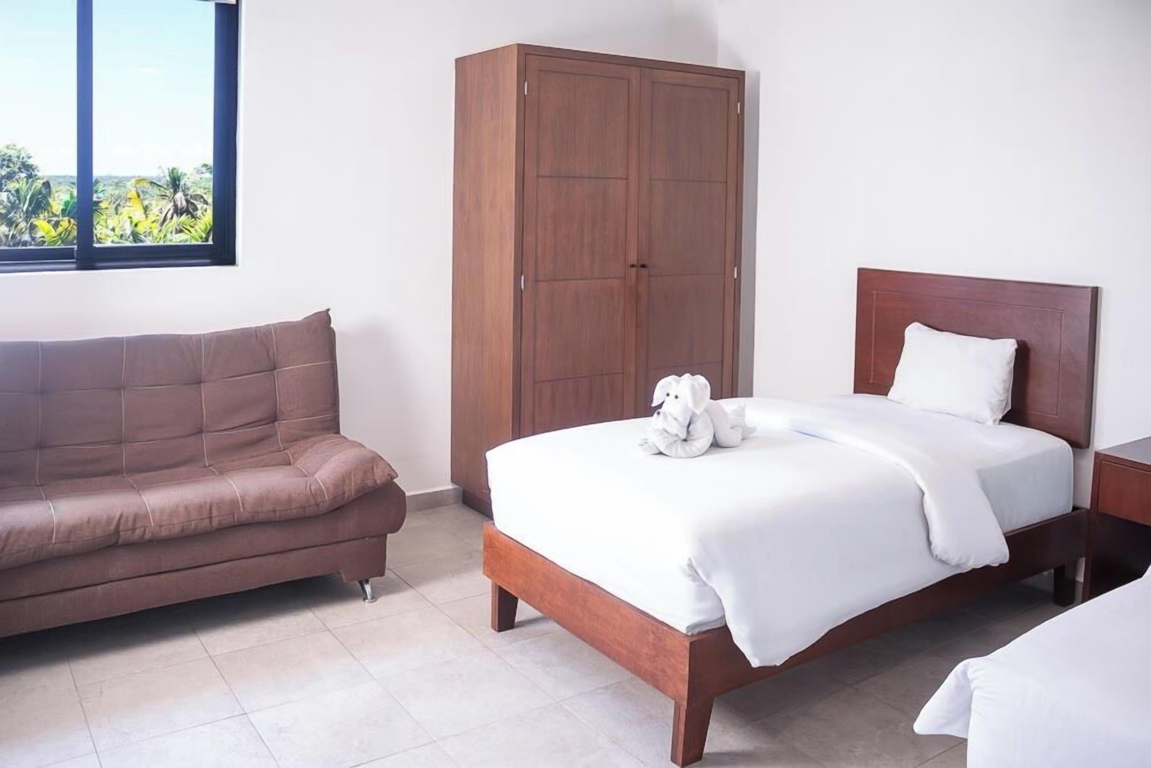 Caja fuerte, wifi gratis, ropa de cama y accesible en silla de ruedas