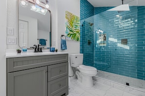 Hair dryer, towels, soap, shampoo