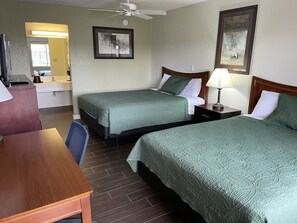Newly remodeled rooms, 2 Queen Beds, Non-smoking, Not Pet Friendly | 2 chambres, bureau, Wi-Fi gratuit, draps fournis