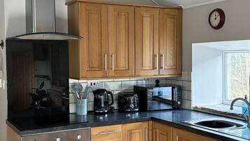 Fridge, microwave, oven, cookware/dishes/utensils