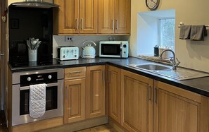 Fridge, microwave, oven, cookware/dishes/utensils