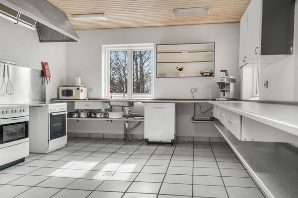 Fridge, stovetop, dishwasher, coffee/tea maker