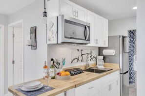Fridge, microwave, dishwasher, coffee/tea maker